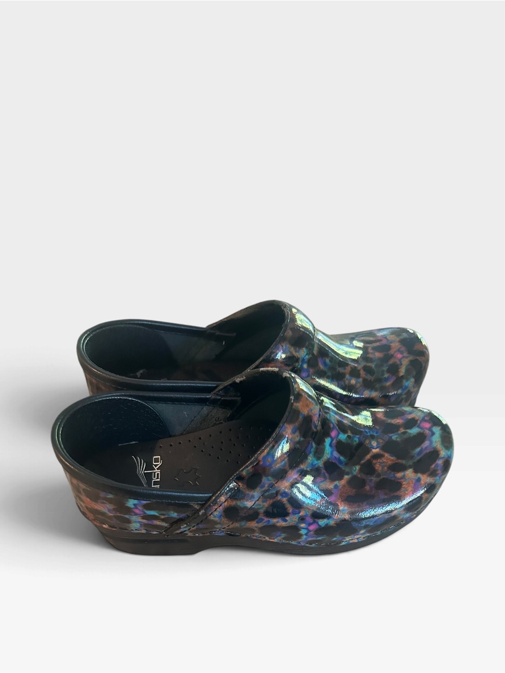Dansko ladies size 6 Multicolor Leopard-Print Clogs